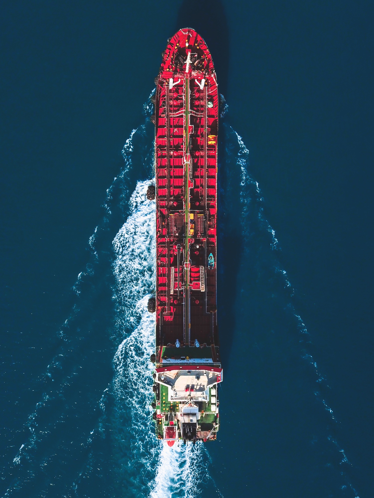 Aerial view of oil tanker ship. Industrial ship on the move. Environmental issues and climate change