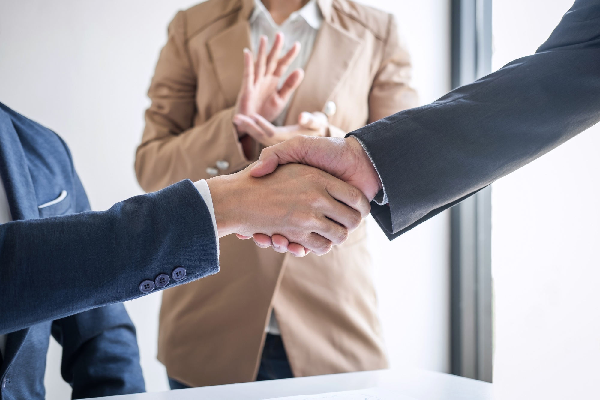 Business handshake and business people after discussing good deal of Trading contract and projects